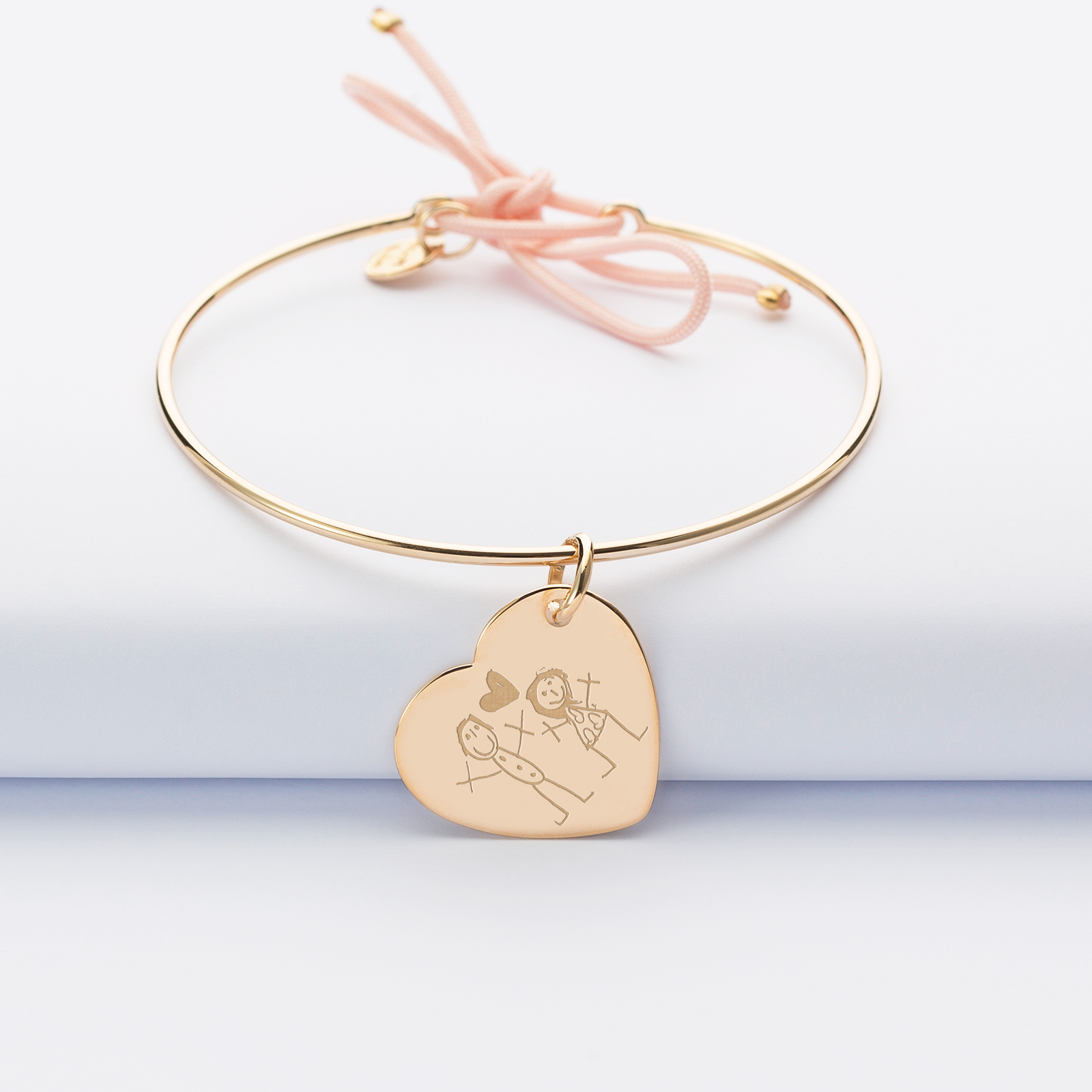 Personalised gold-plated bangle and engraved heart medallion 19x21mm with cord sketch 