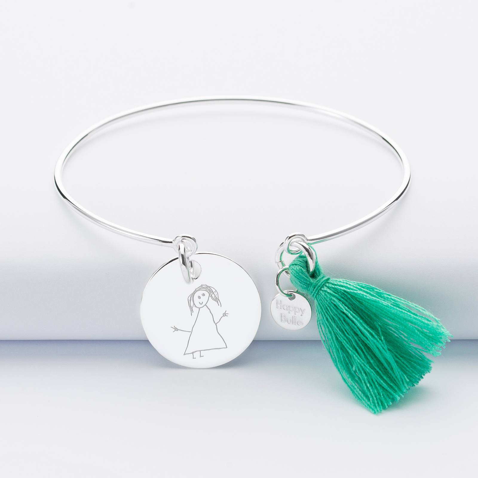 Personalised silver tassel bangle and 19 mm medallion sketch
