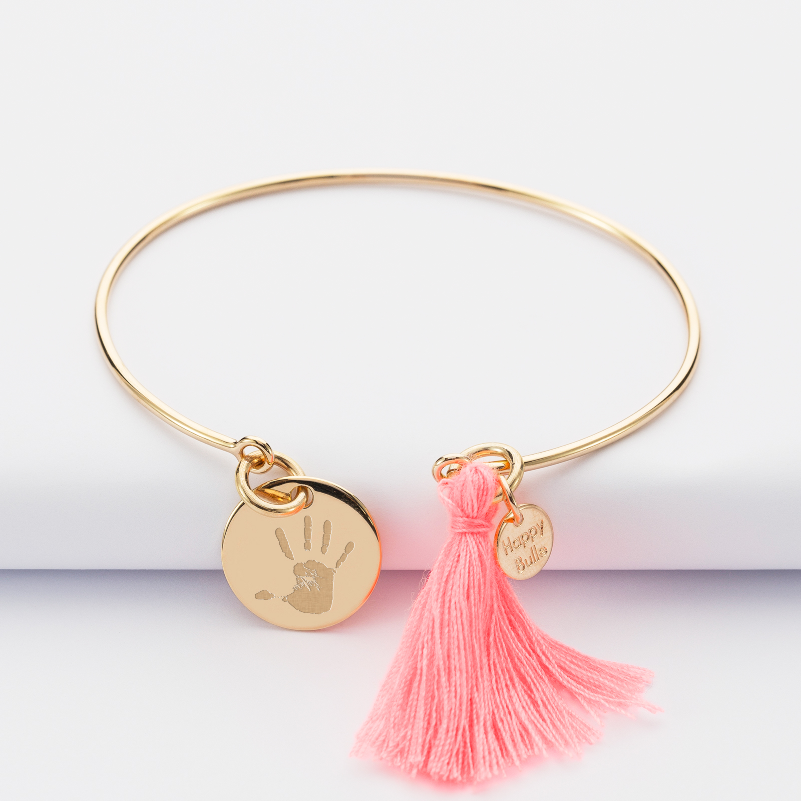 Personalised gold plate bangle with tassel and 15mm engraved medallion imprint