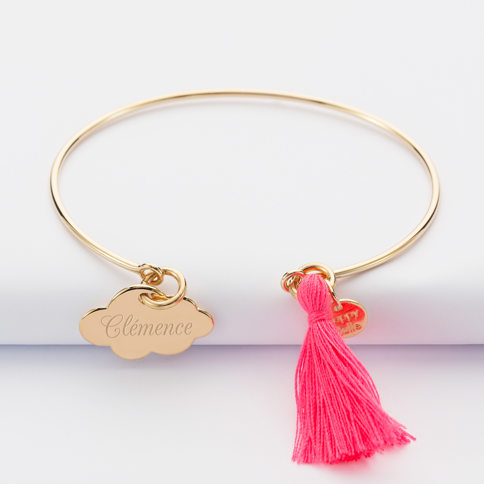 Personalised gold-plated bangle and engraved tassel medallion 20x14mm with cord name 1
