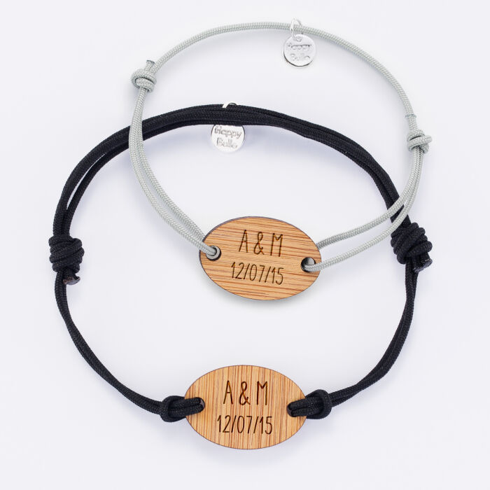 Pair of personalised bracelets with engraved oval wooden medallions 25x17mm dates