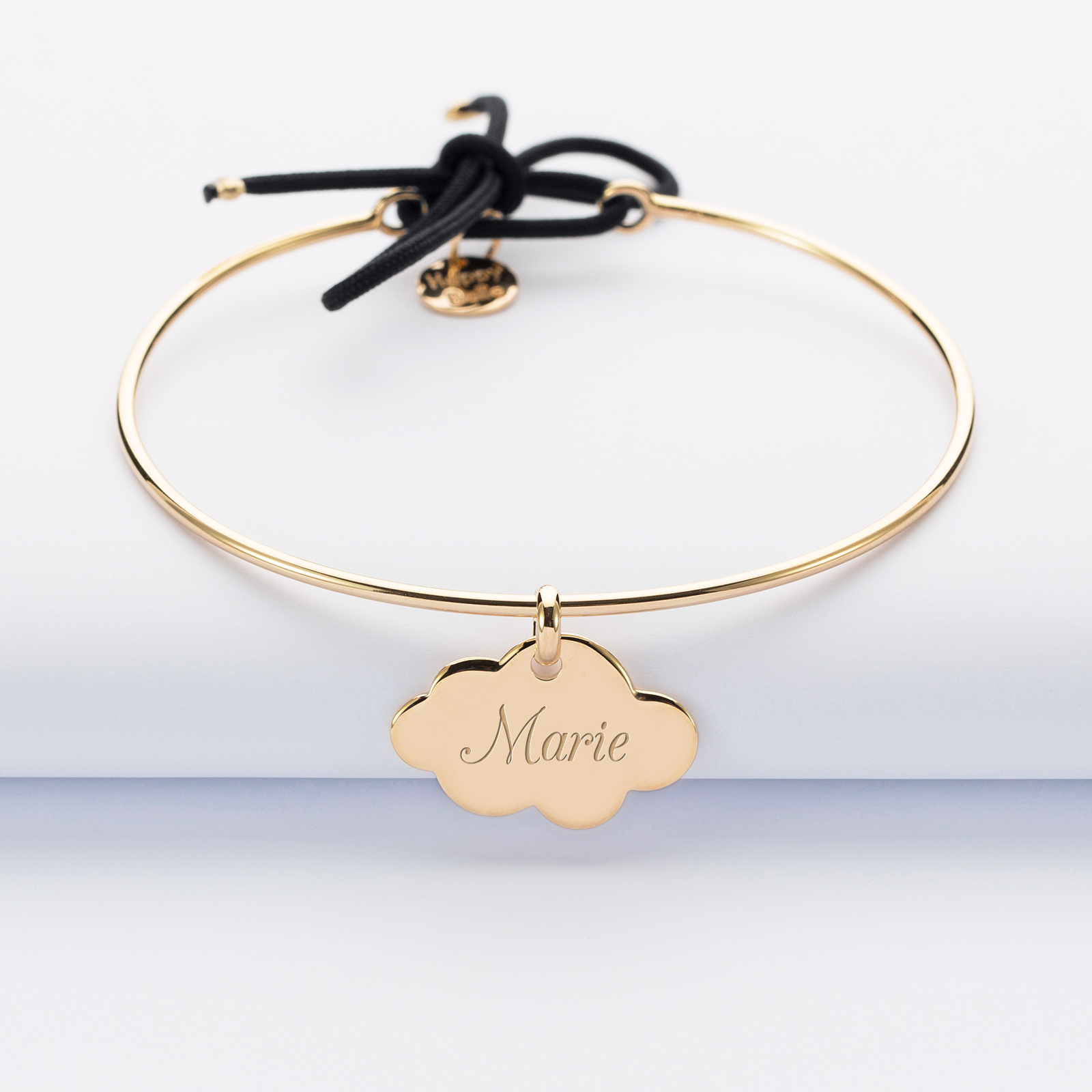 Personalised gold-plated bangle and engraved cloud medallion 20x14mm with cord name 1