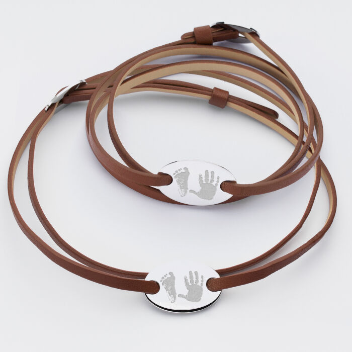 Pair of personalised leather bracelets with engraved 2-hole oval silver medallions 25x16mm - imprints