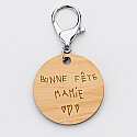 Personalised engraved wooden "We love you Grandma" round name medallion keyring 50mm - back - writing
