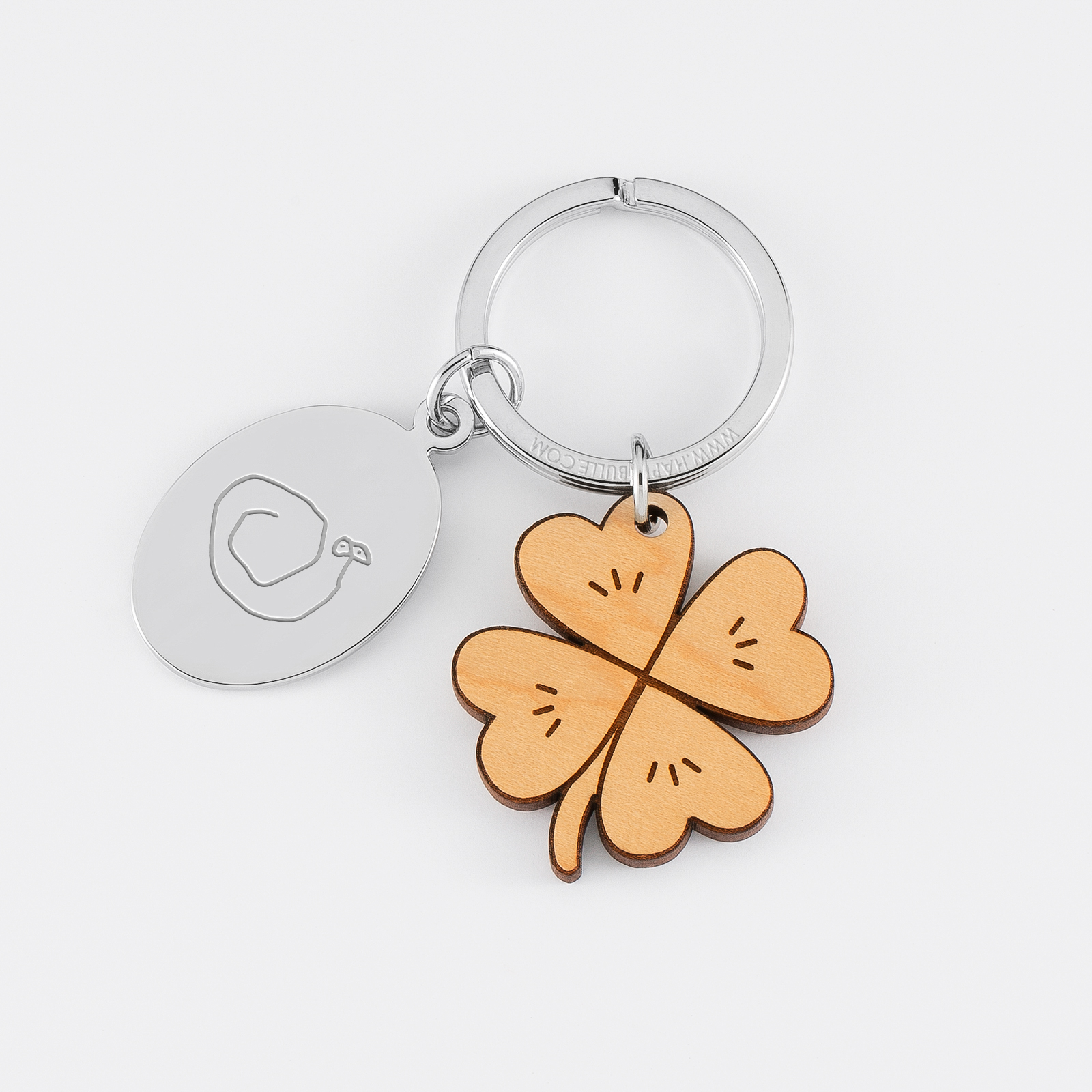 Personalised engraved oval steel medallion and wooden clover charm keyring - sketch