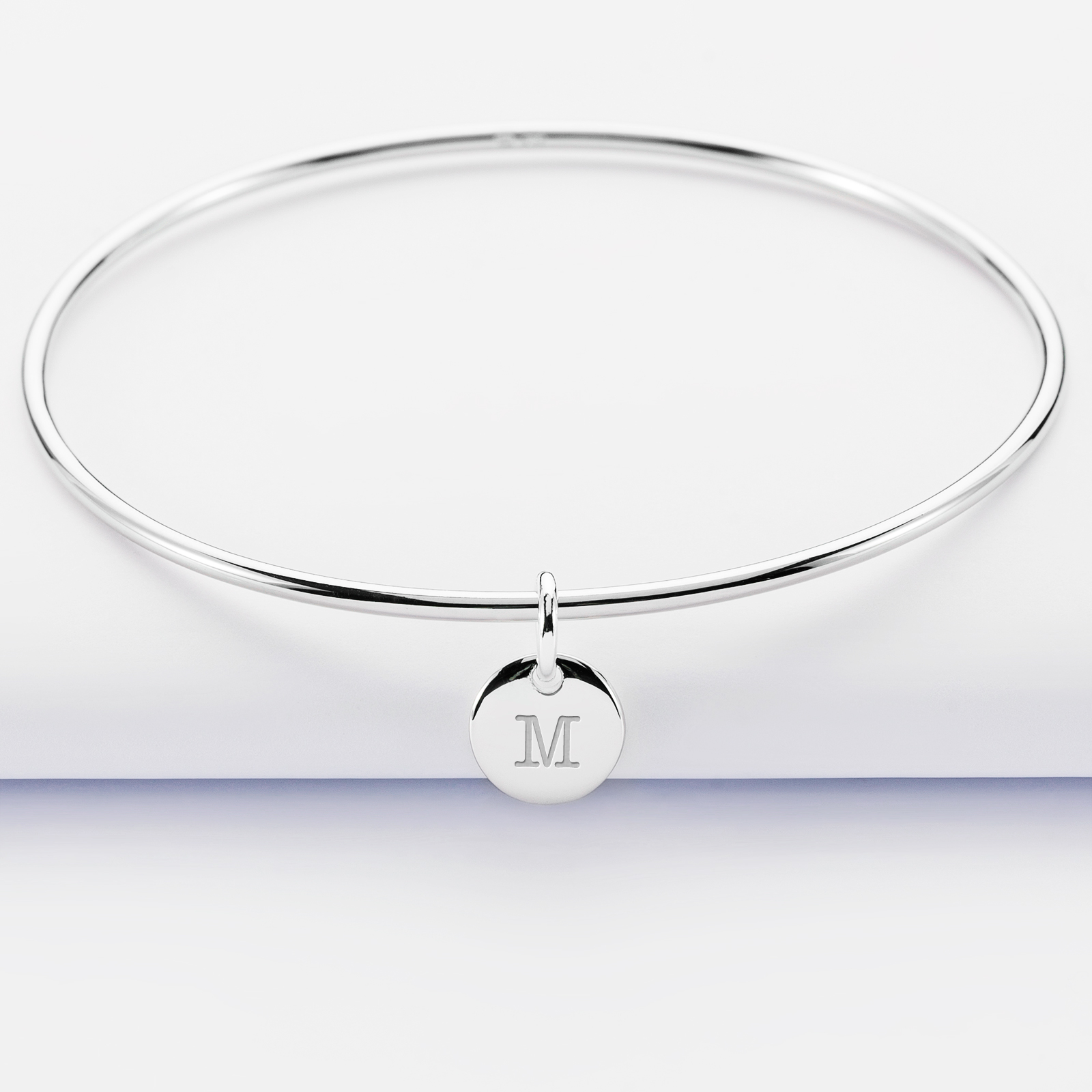 Personalised silver bangle and 10 mm engraved initial medallion - 1