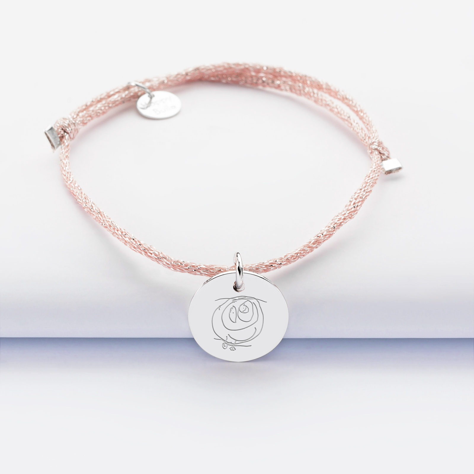 Sparkly cord bracelet with personalised engraved silver medallion 15 mm sketch
