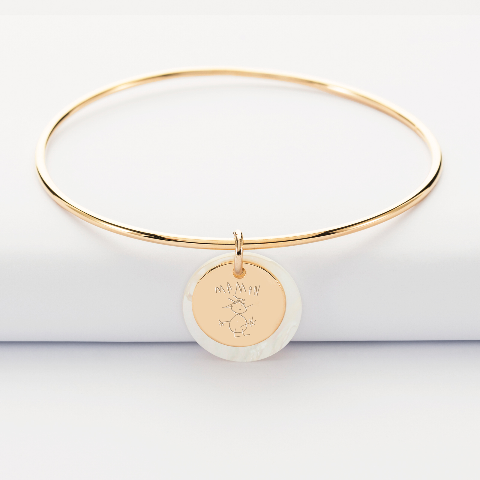 Personalised gold plated mother of pearl bangle and 15 mm engraved medallion - sketch