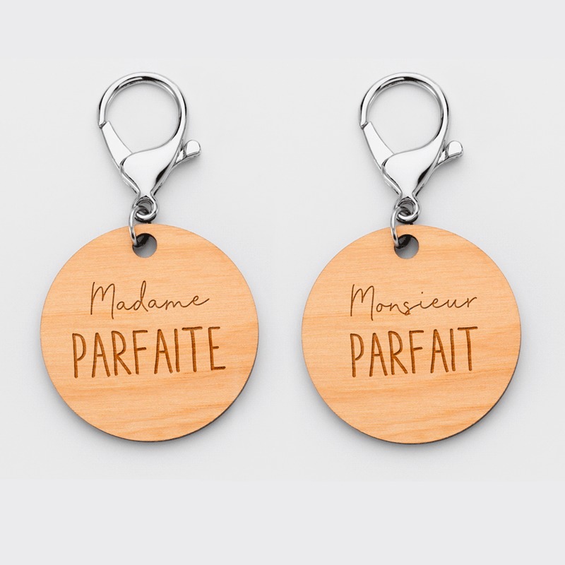 Pair of personalised engraved wooden round 50mm "Mr. Ms." medallion keyrings 1