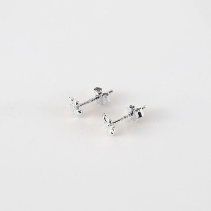 Boucles d'oreilles puces petite fleur argent - biais