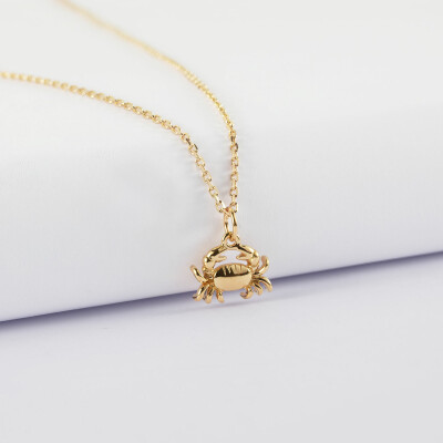 Pendentif crabe plaqué or 7x12 mm