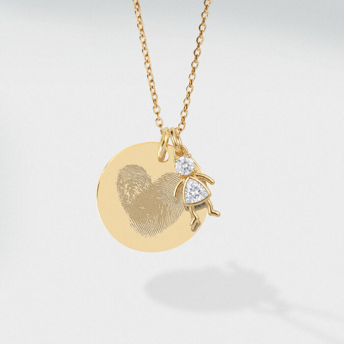 Pendentif personnalisé médaille gravée plaqué or 19 mm et breloque silhouette scintillante - empreinte