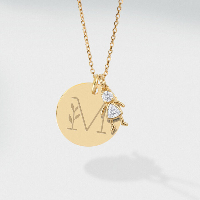 Pendentif personnalisé médaille gravée plaqué or 19 mm et breloque silhouette scintillante - illustration