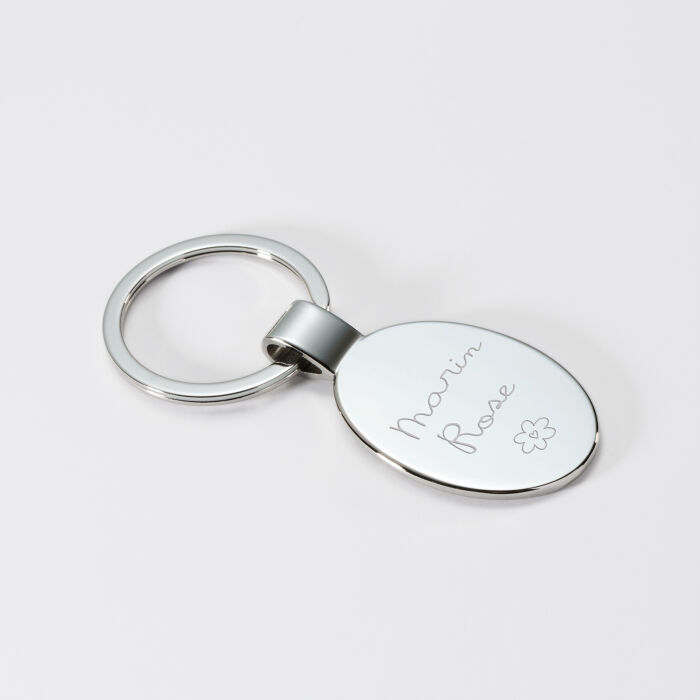 Porte clé personnalisé gravé acier ovale 30x41 mm - prénoms