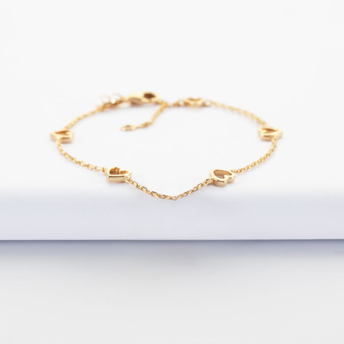 Bracelet chaîne cœurs ajourés plaqué or - face